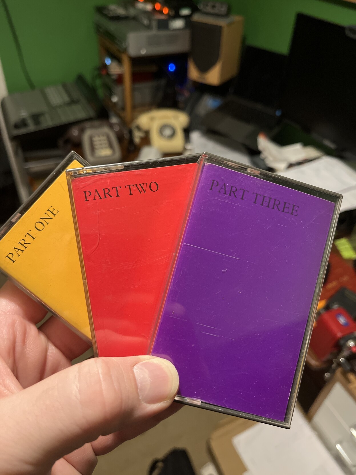 3 cassette boxes being held in David's hand